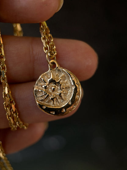 solid yellow gold pendant with moon and sun design ancient relic